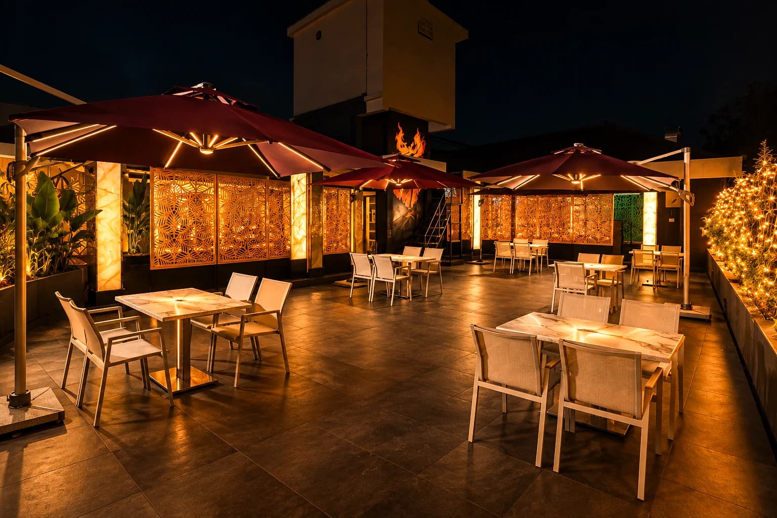 Umbrella tables on the CasaBay open deck